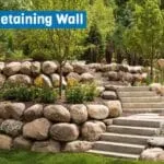 How to Build a Boulder Retaining Wall: Design Ideas, Materials & Costs